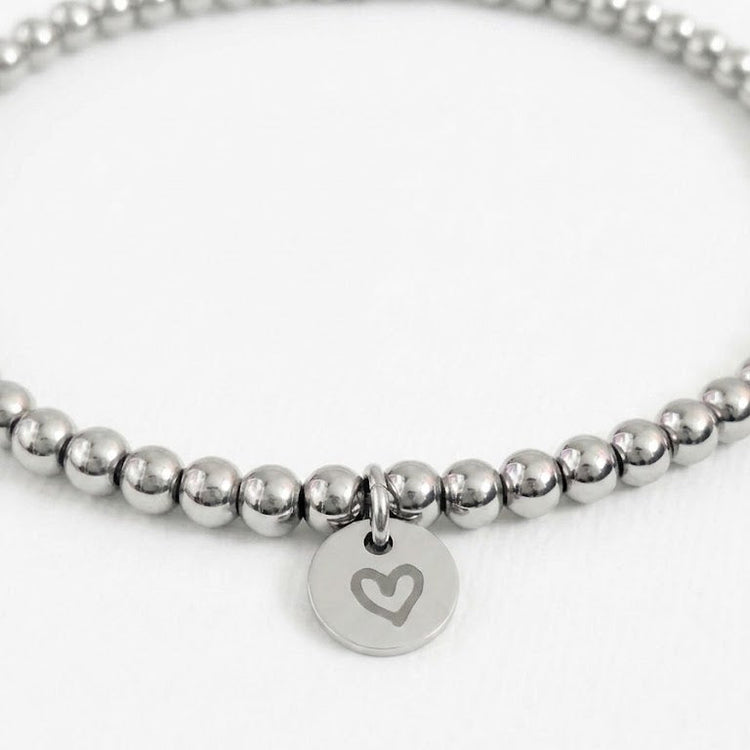 Custom bracelet with kids drawing of heart