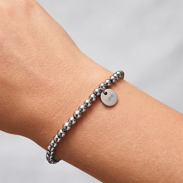 Personalised handwriting bracelet on arm