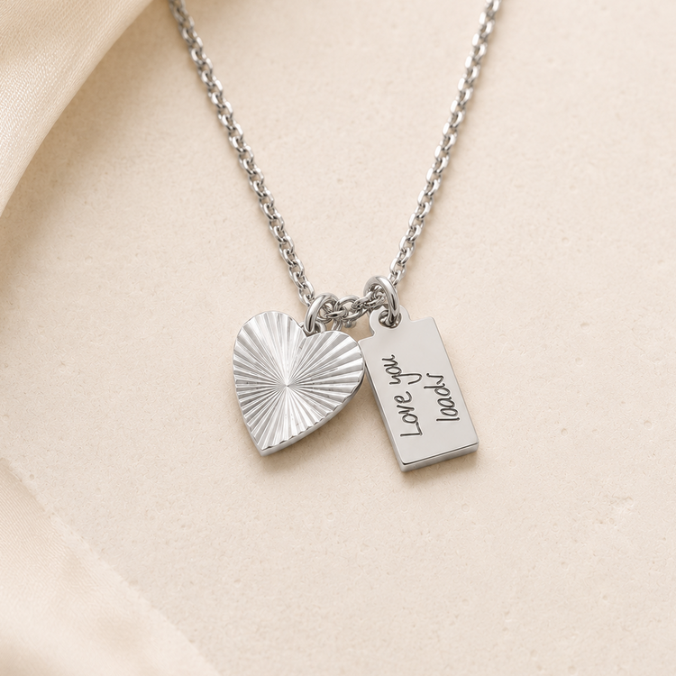 Silver necklace with heart and rengraved ectangular tag 