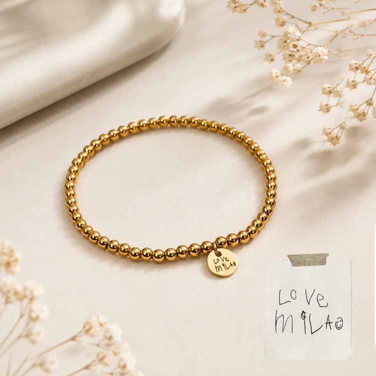 Bracelet with kids writing