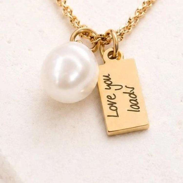 Close up of engraved personalised necklace