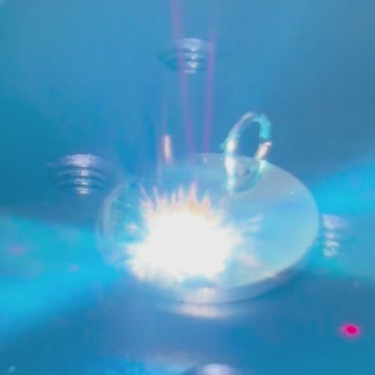 Laser engraving a pet paw print onto a jewellery charm