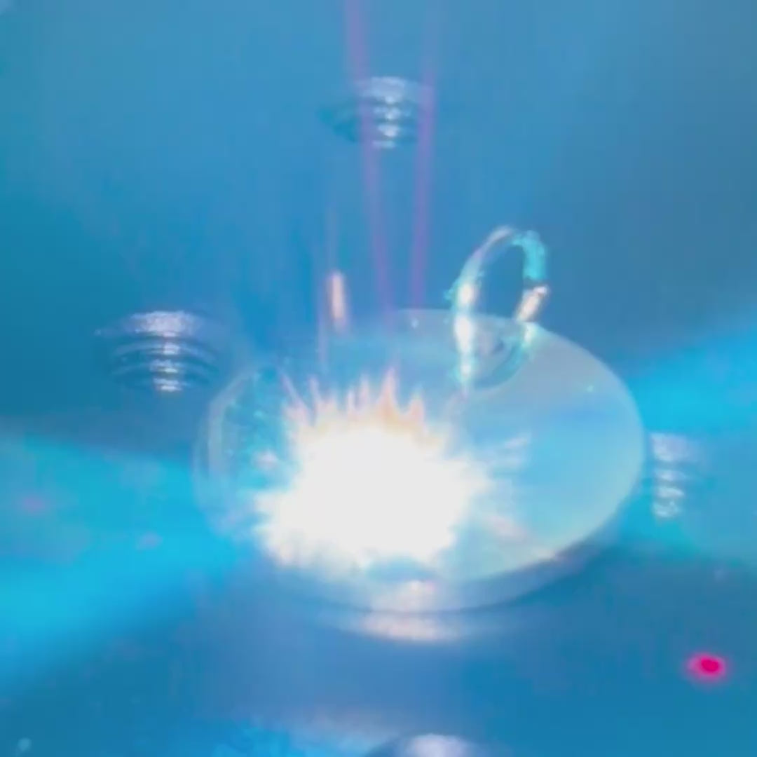 Laser engraving a pet paw print onto a jewellery charm
